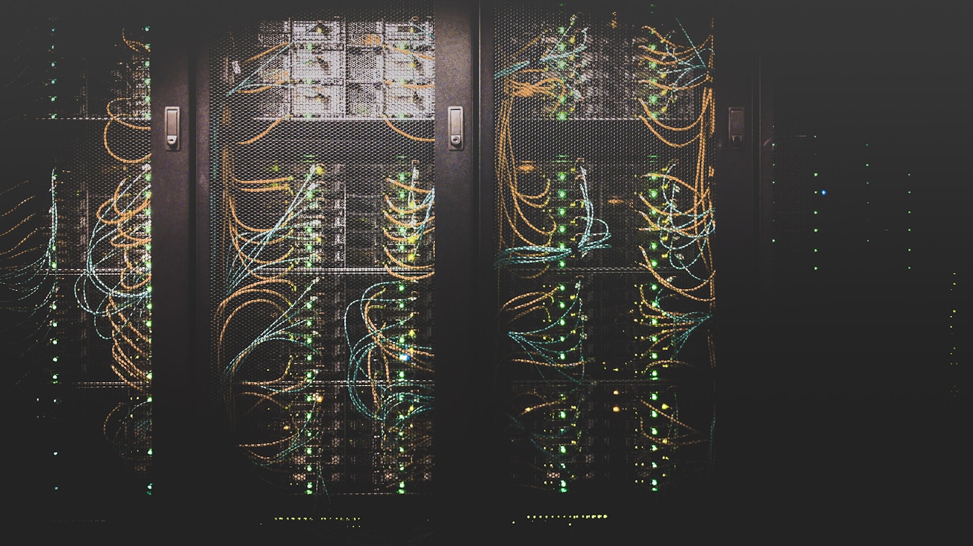 Illustrative stock photo: rows of servers in a rack, suggesting reliable infrastructure (not our shop).
